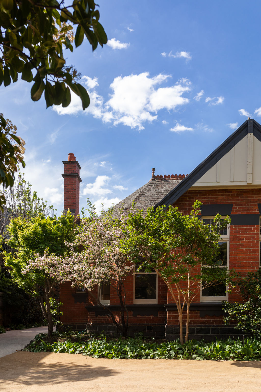 The home is set well back from the street behind a deep front garden. Photo: Greg Briggs