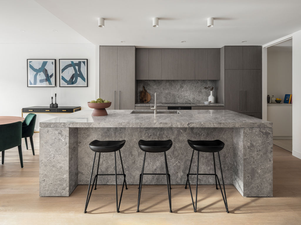 The ESC kitchen benches boast large continuous slabs of marble perfect for gathering around. Photo: Supplied