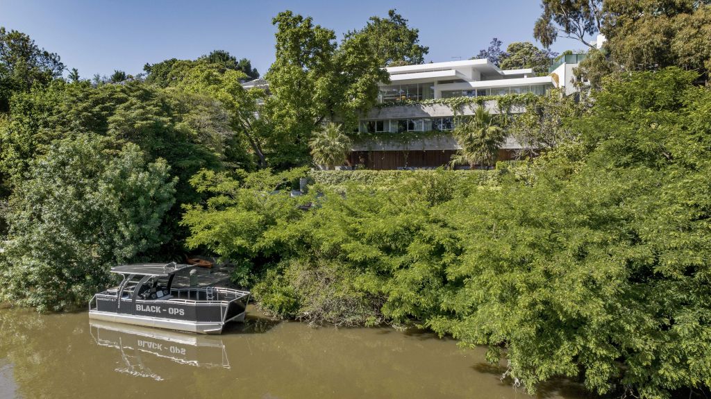 The property comes with its own private jetty and boat mooring. Photo: Supplied