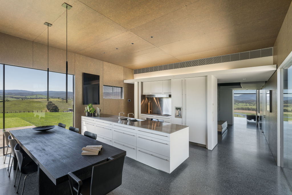 The kitchen sits in the middle of the home. Photo: Kay &amp; Burton
