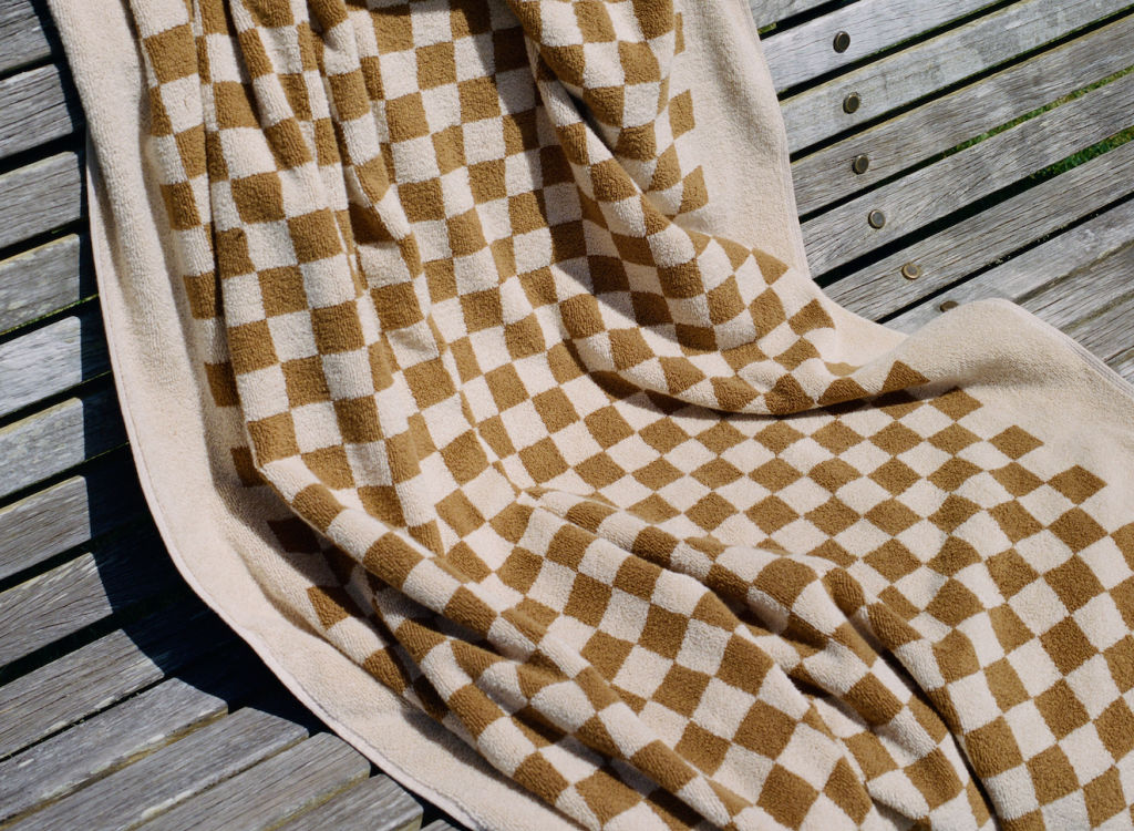 Roman towel by BAINA is made from 100 per cent organic cotton.