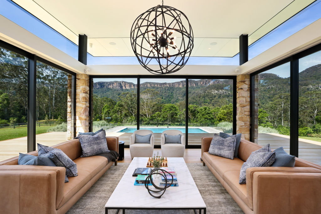 Floor-to-ceiling double-glazed windows provide stunning views of Kangaroo Valley. Photo: Supplied