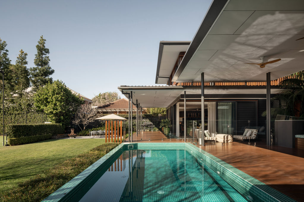 The pool in this Clayfield home is complete with an underwater window. Photo: Supplied