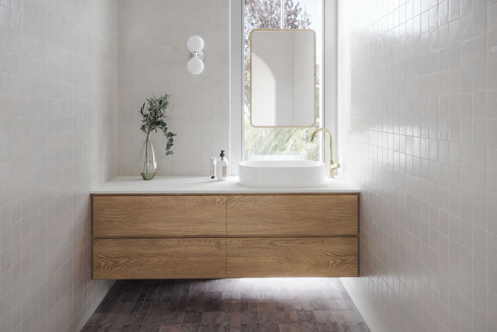 Whether it’s in the shape of mirrors, basins, or vanities, straight lines and sharp corners are out. Photo: Arquette Interiors