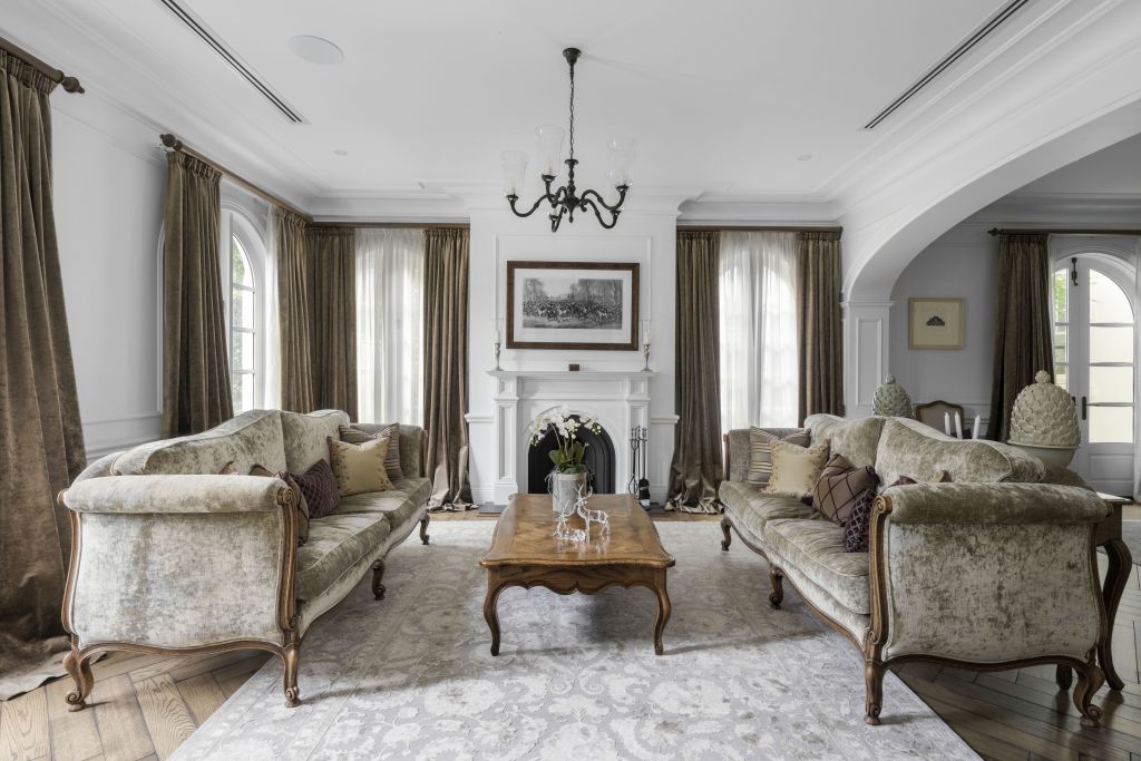 Arched French doors lead from the living area to the al fresco area. Photo: Supplied