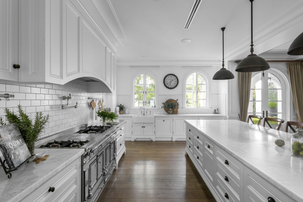 The marble-clad kitchen offers plenty of bench space. Photo: Supplied