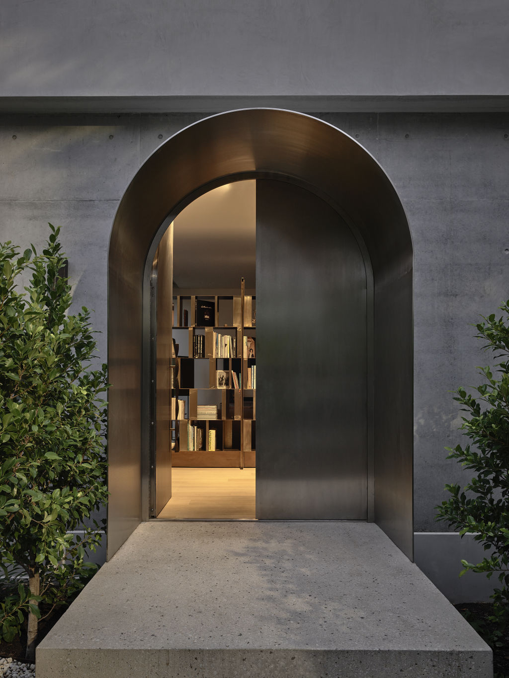 Inglis created a stunning arched stainless-steel entryway for a recent project. Photo: Derek Swalwell