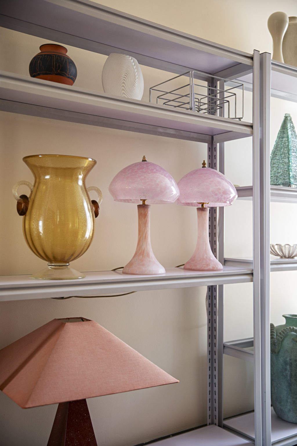 A pink, ’70s La Rochere mushroom table lamp is currently on display in Brown's living room. Photo: Natalie Jeffcott