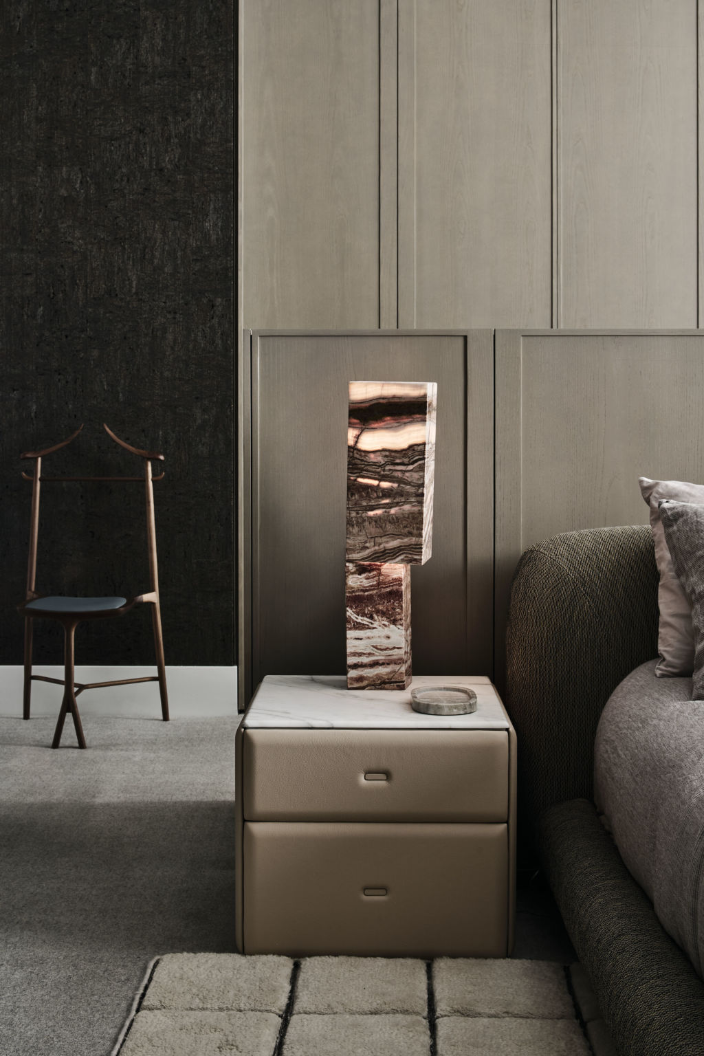 The KINK&nbsp;Fantastico Onyx&nbsp;table lamps are a feature of the bedroom. Photo: Tom Blatchford