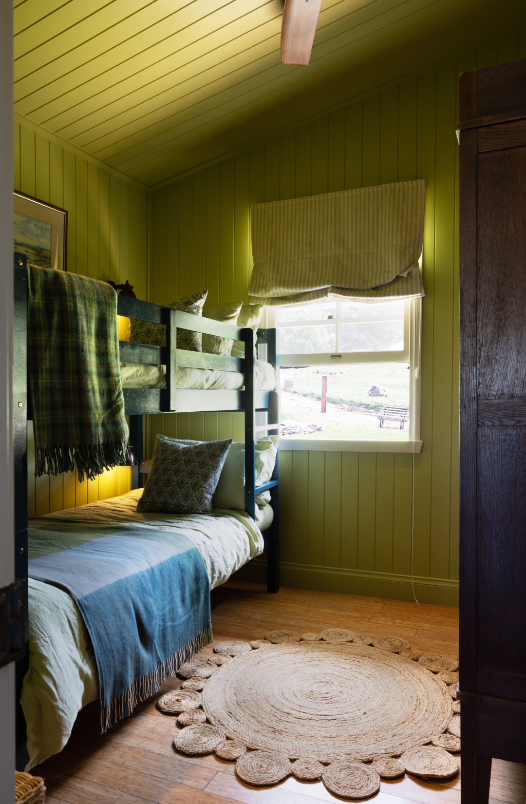 'We wanted to go to town on colour – so we did,' Carlene says, as seen here in the citrine-toned bedroom. Photo: Louise Roche