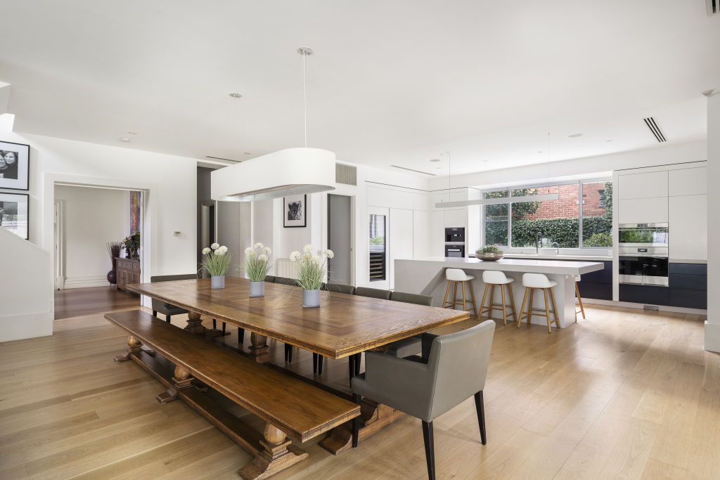 The large dining area and custom kitchen are a standout. Photo: Supplied