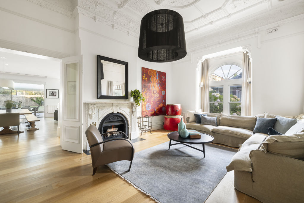 Decorative plaster ceilings are a feature of the formal living room. Photo: Supplied