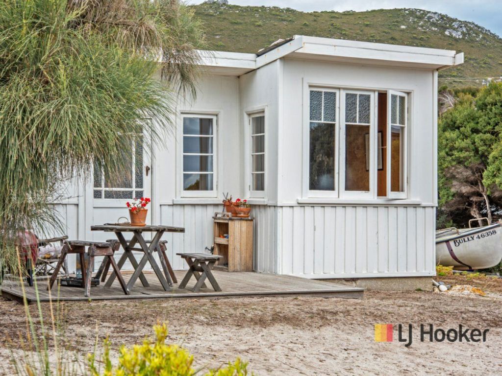 A buyer will dream about affordable beach living no longer, sweeping this Tassie shack under offer. Photo: LJ Hooker Wynyard