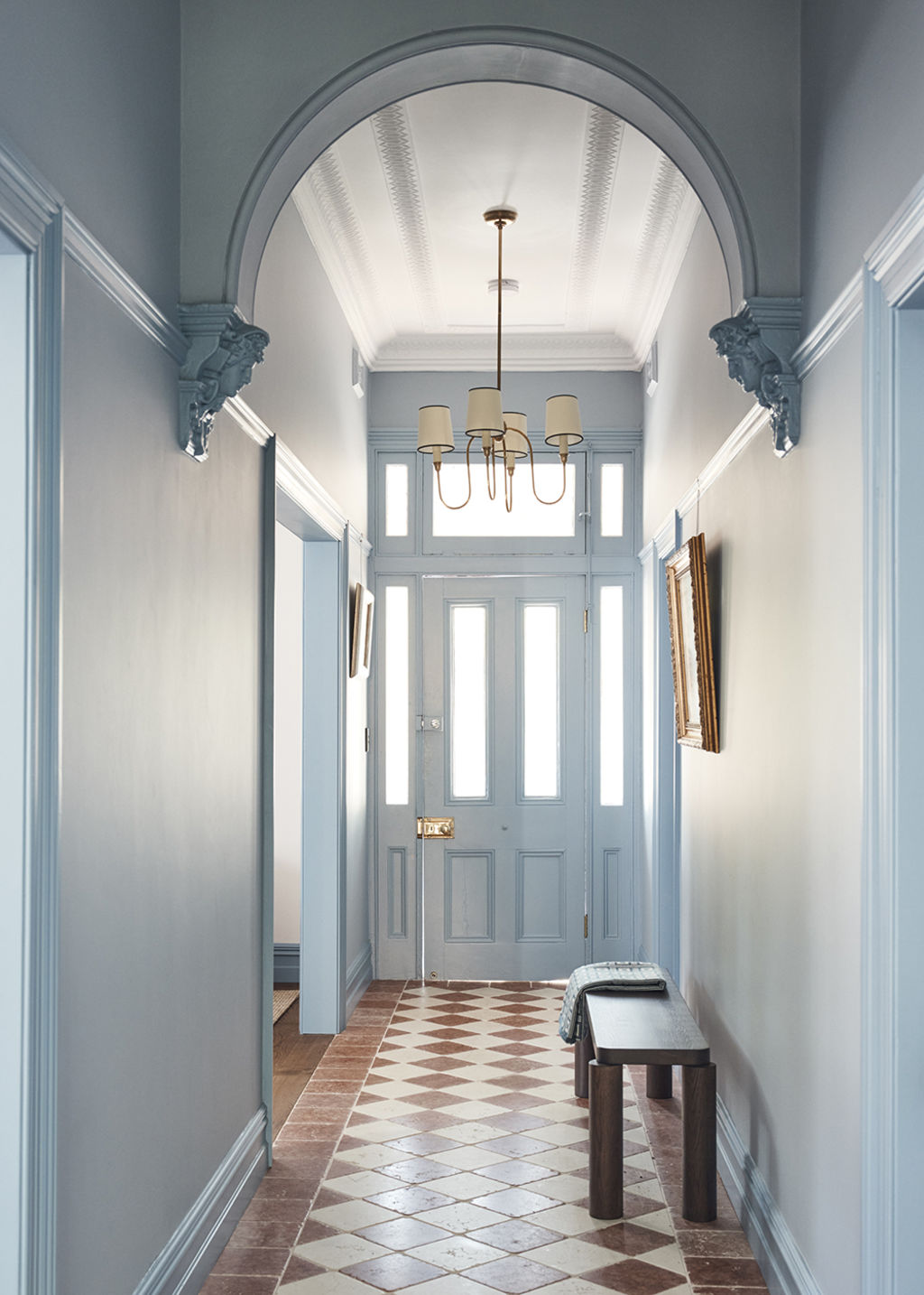 The home's decorative ceilings and archways are original. Photo: Damian Bennett
