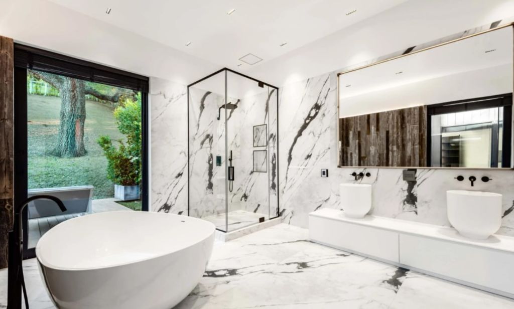 Marble floors add touches of glamour the space. Photo: Concierge Auctions