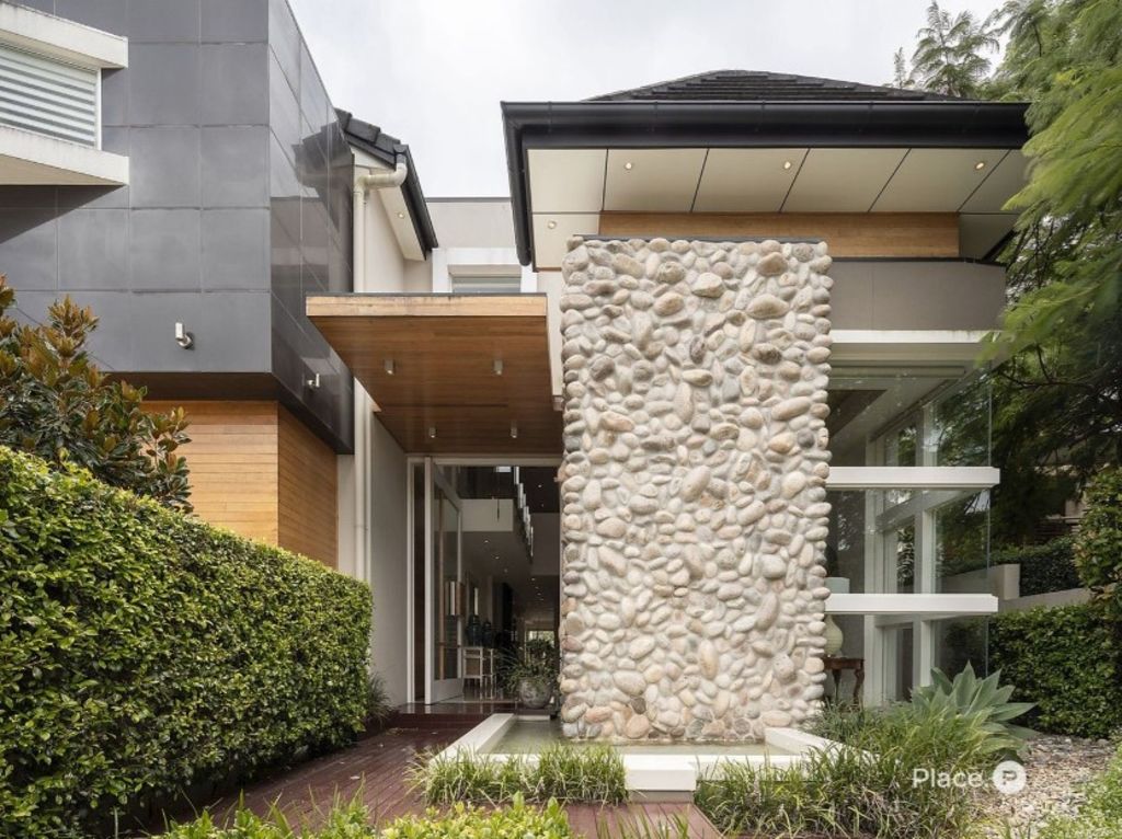 A pond starts at the front of the house and flows into the foyer. Photo: Place Estate Agents Bulimba