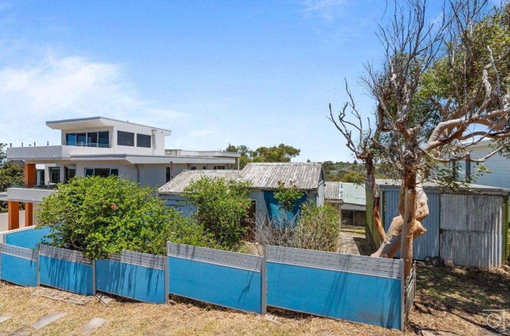 This rundown shack in NSW sold for $860,000 at auction and is in a prime position. Photo: Aspect Port Stephens