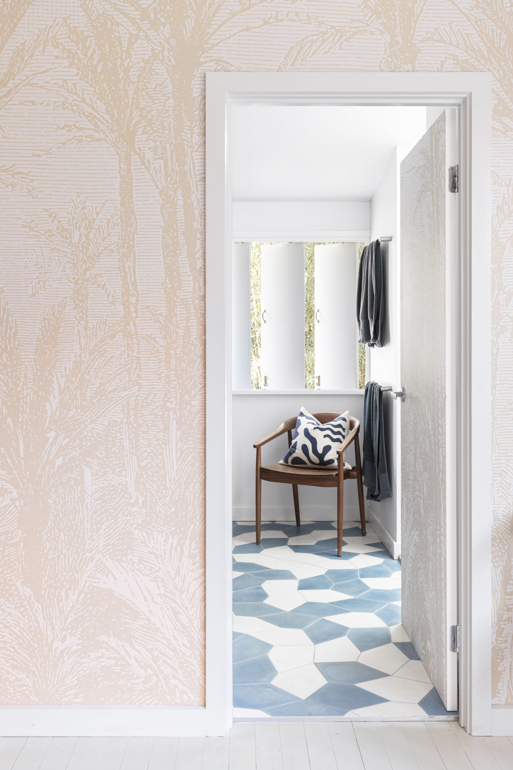 Brisbane designer Aude Charmetant loves matching tiles with colourful walls and adding prints where you may not expect them. Photo: Tari Peterson