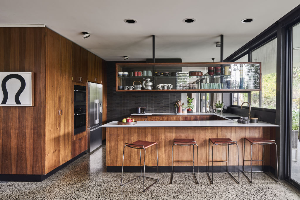 The original timber cabinetry has been retained in the kitchen. Photo: Supplied