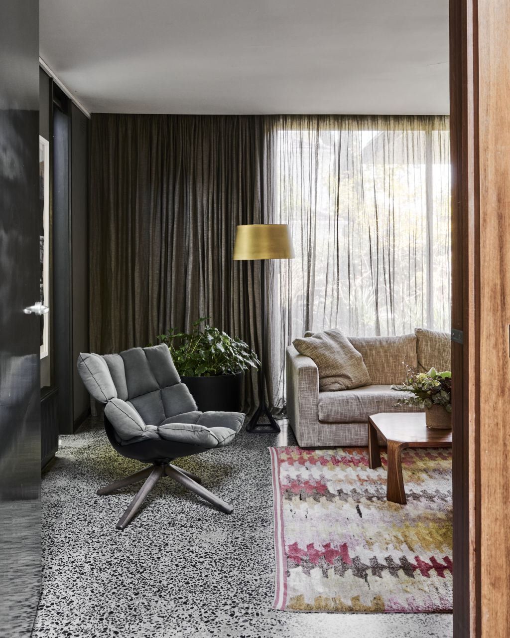 Polished concrete floors flow across into the central living area. Photo: Supplied