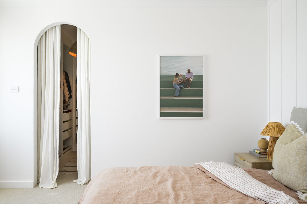 The couple replaced the carpets, doors, curtains and fixtures and added an en suite and walk-in wardrobe to their main bedroom. Photo: Atelier Photography