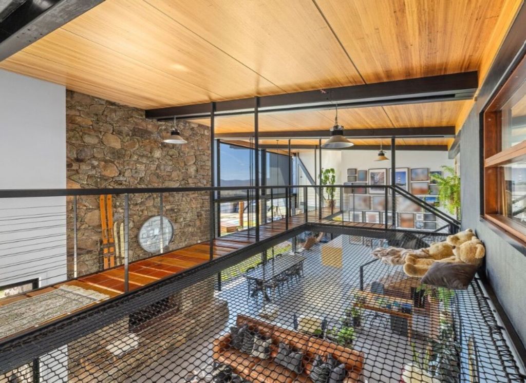 The Jindabyne home has a circus net above the living area. Photo: Henley Property