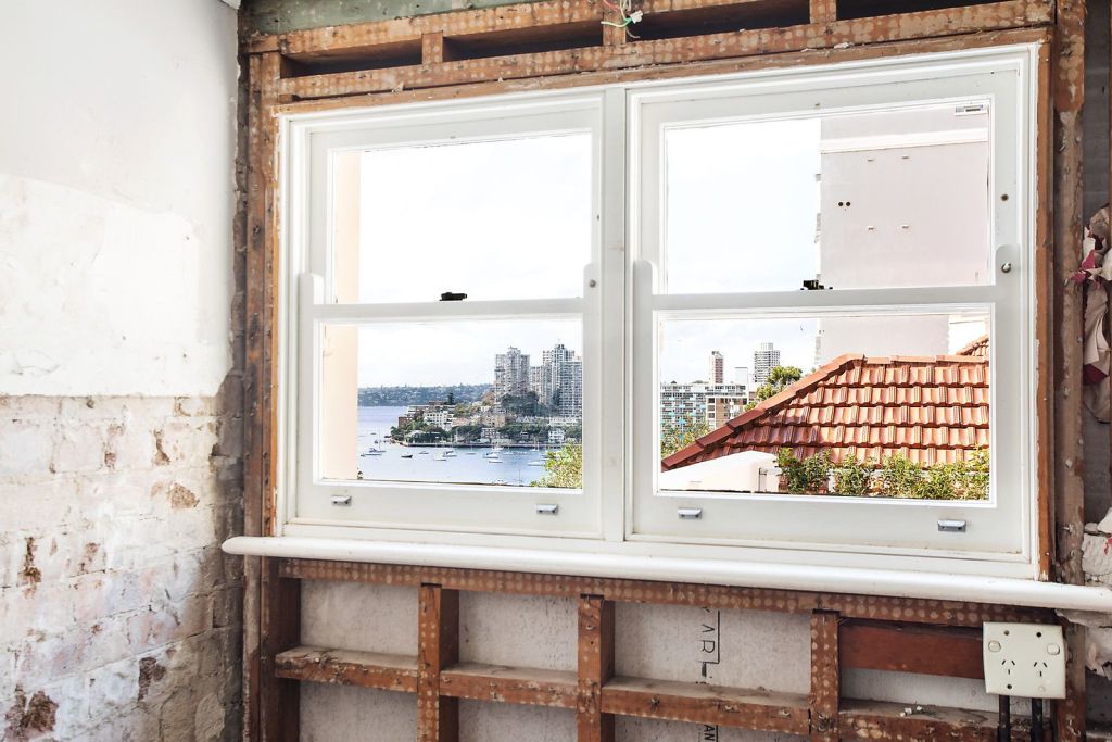 Water panoramas are captured from various vantage points throughout the three-bedroom apartment, which has its own entrance. Photo: Sydney Sotheby's International Realty