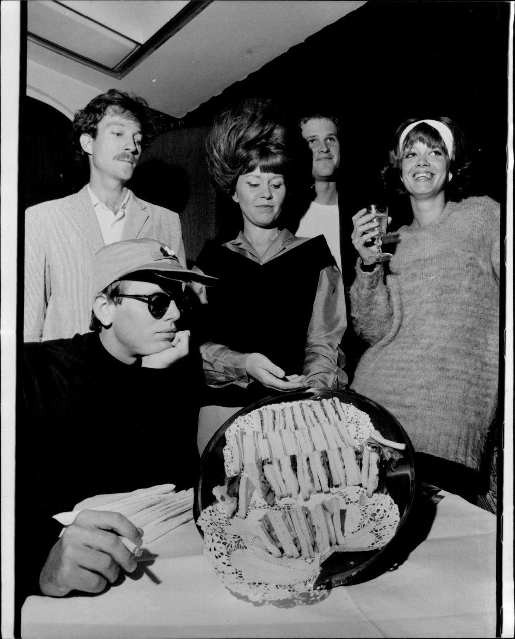 Rock band the B-52s - left to right, Fred Schneider 27, Kate Pierson 31, Keith Strickland 25, and Cindy Wilson 22 (seated) Rickey Wilson 22, at a press conference at the Sebel, June 18, 1980.  Photo: Gerrit Alan Fokkema/Fairfax Media