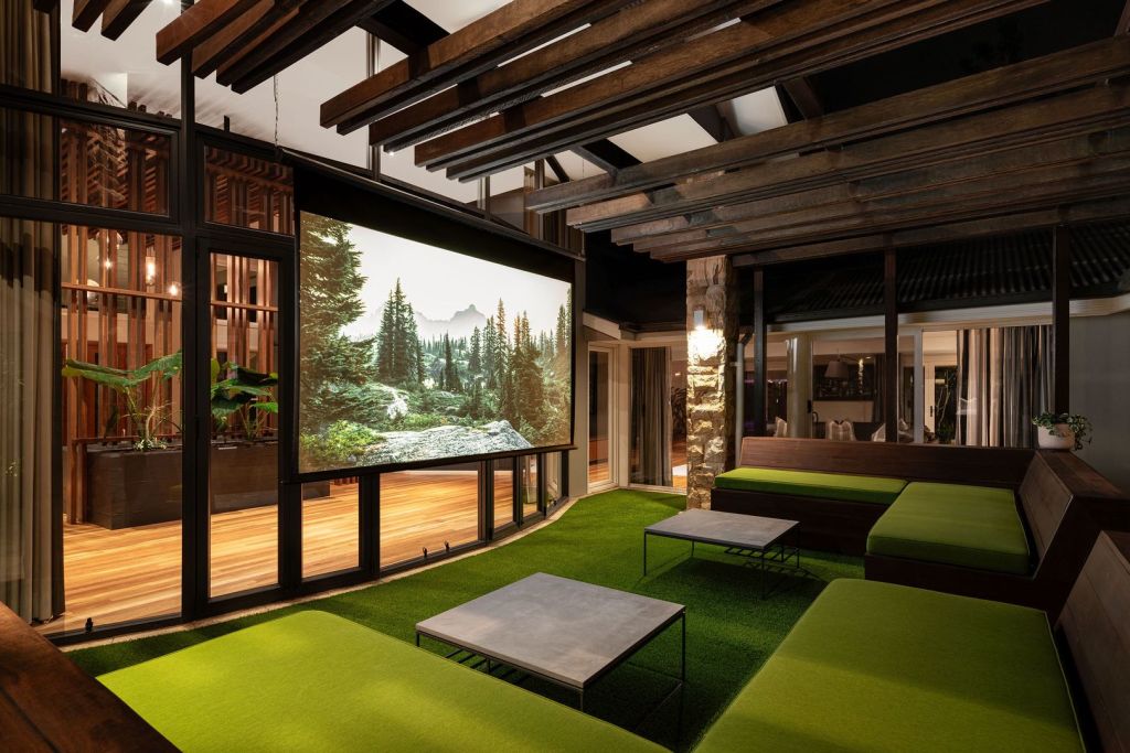 The outdoor movie theatre with seating and surround sound. Photo: Queensland Sotheby's International Real Estate