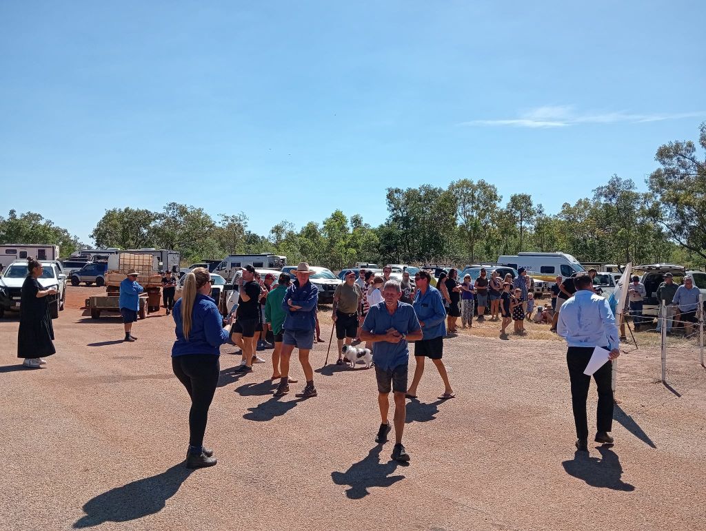 The crowd gathered for the auction of Paddy's Place in Larrimah, NT. Photo: The Pink Panther Hotel Facebook