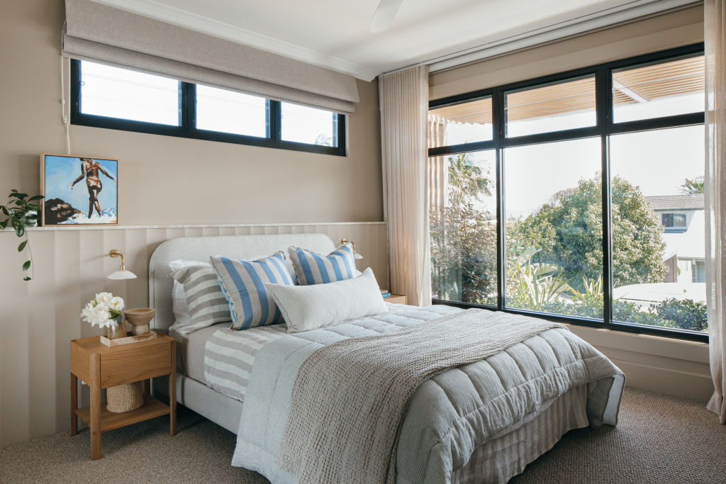 The large windows let in plenty of natural light during the day and blockout blinds ensure a comfortable sleep-in. Photo: Grace Picot