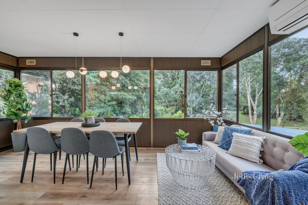 The property has mid-century flair throughout, and a leafy outlook. Photo: Jellis Craig