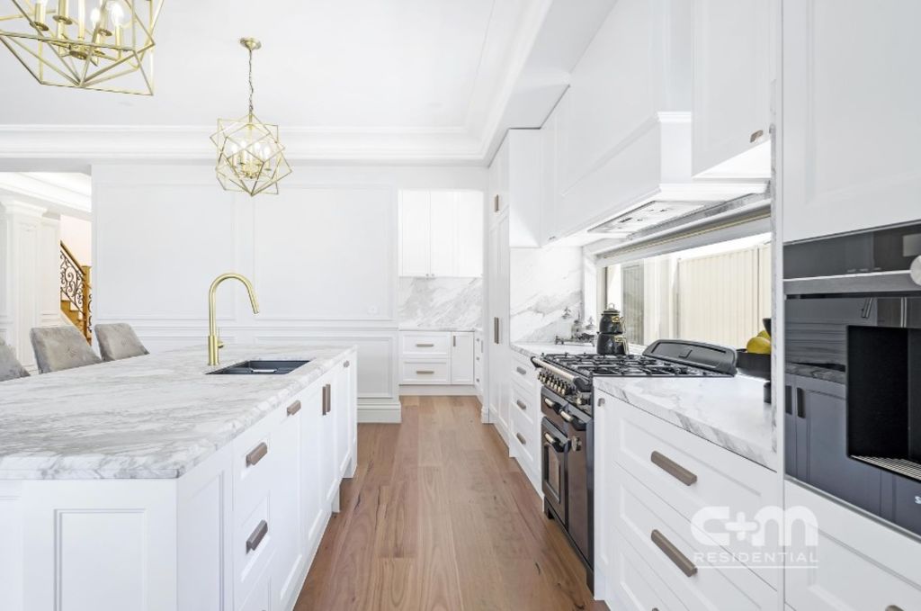 The vendors splashed $85,000 on Calacatta gold Italian marble. Photo: C+M Residential