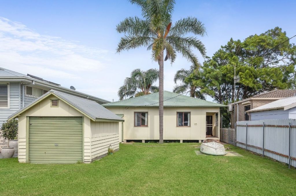 The shack may be nondescript from the street, but is a prime piece of real estate. Photo: McGrath Estate Agents Ulladulla