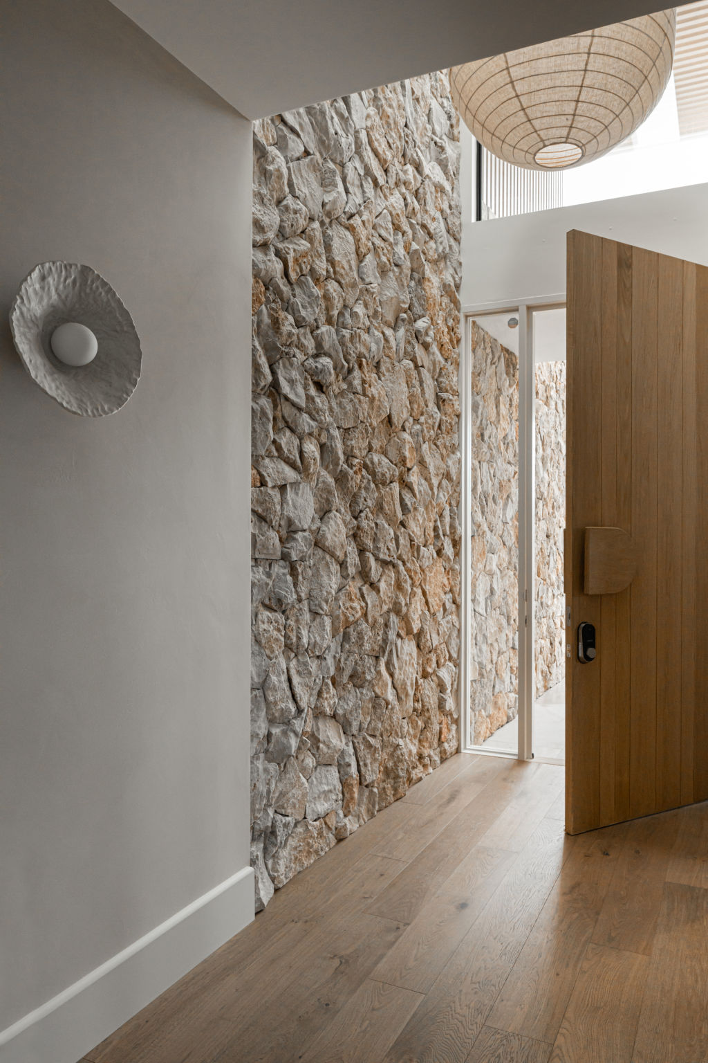 The meticulously placed stone extends all the way up into the entryway void. Photo: Grace Picot