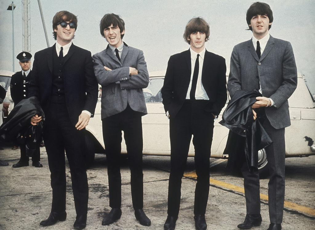 Lennon is pictured far left with his Beatles bandmates. (AP Photo, File)