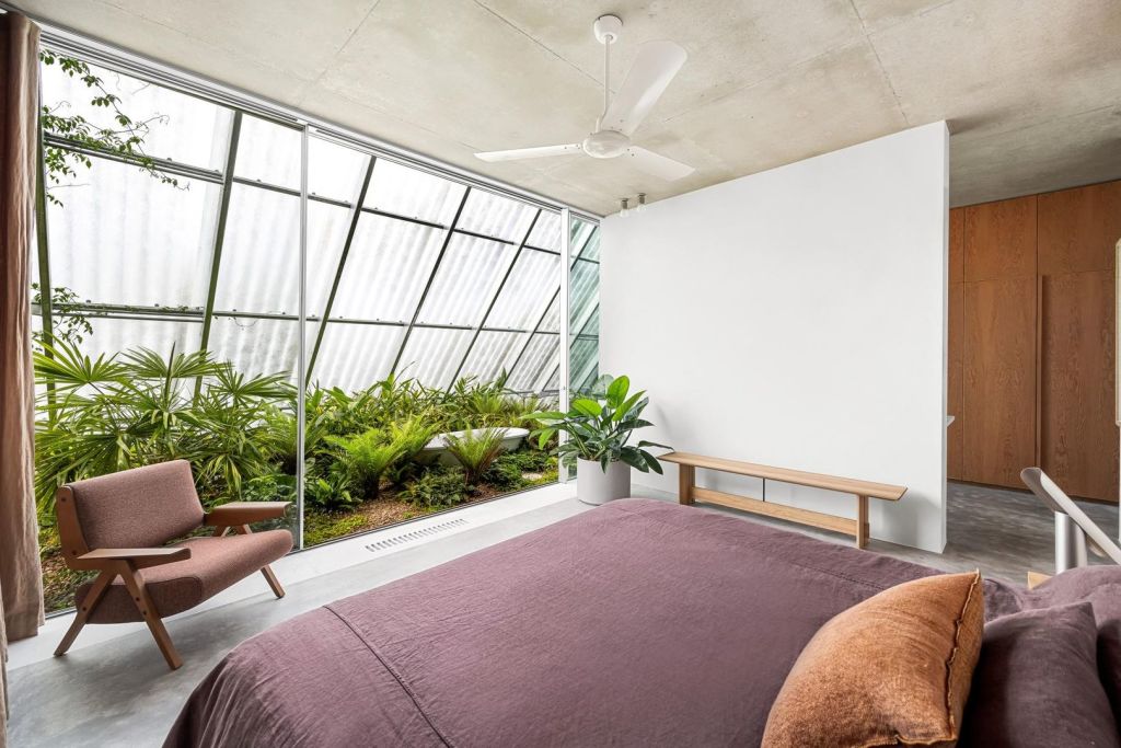 The bath rub coddled in greenery. Photo: PPD Real Estate