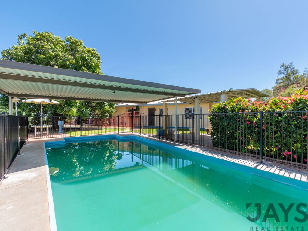 The pool at the enormous, mid-century style Mount Isa home. Photo: Jays Real Estate