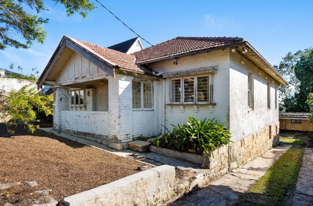 This renovator in Sydney's Mosman sold for a seven-figure sum at auction. Photo: Ray White Lower North Shore Group