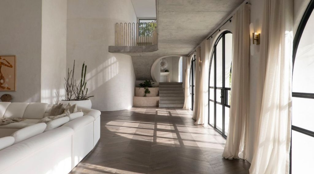 Interiors feature lime-rendered walls and marble detail. Photo: Amir Prestige Group