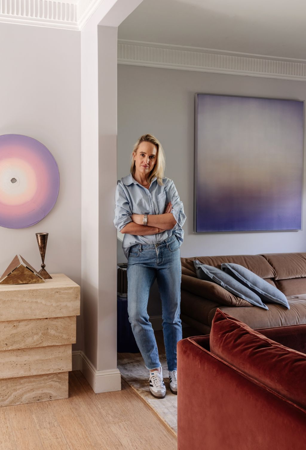 Interior designer Claudia Lambert was inspired to paint her home lilac thanks to an abstract artwork by Amelia Axton. Photo: Hannah Blackmore