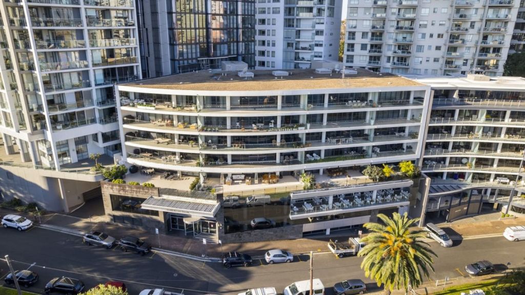 The site, overlooking Lavender Bay and landmarks, is for sale for the first time. Photo: JLL Sydney