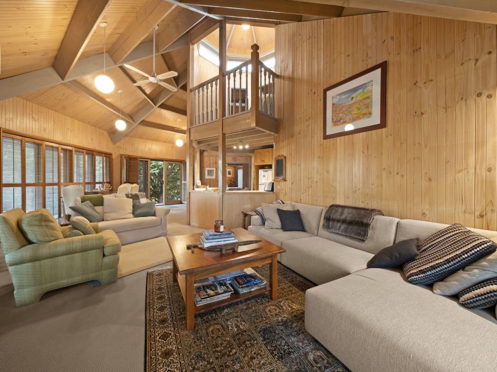 The cottage is crowned by a high ceiling, and has two bedrooms. Photo: District Property Group