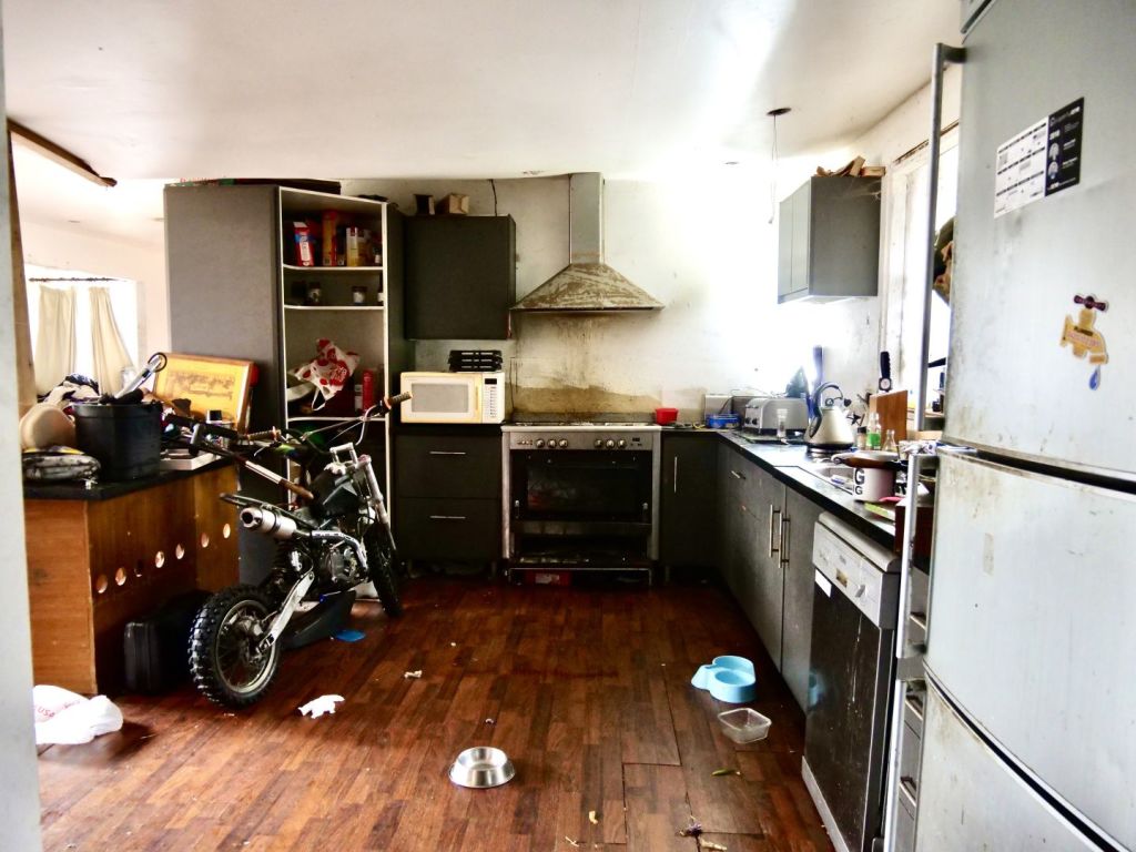 The kitchen has seen better days. Photo: One Agency