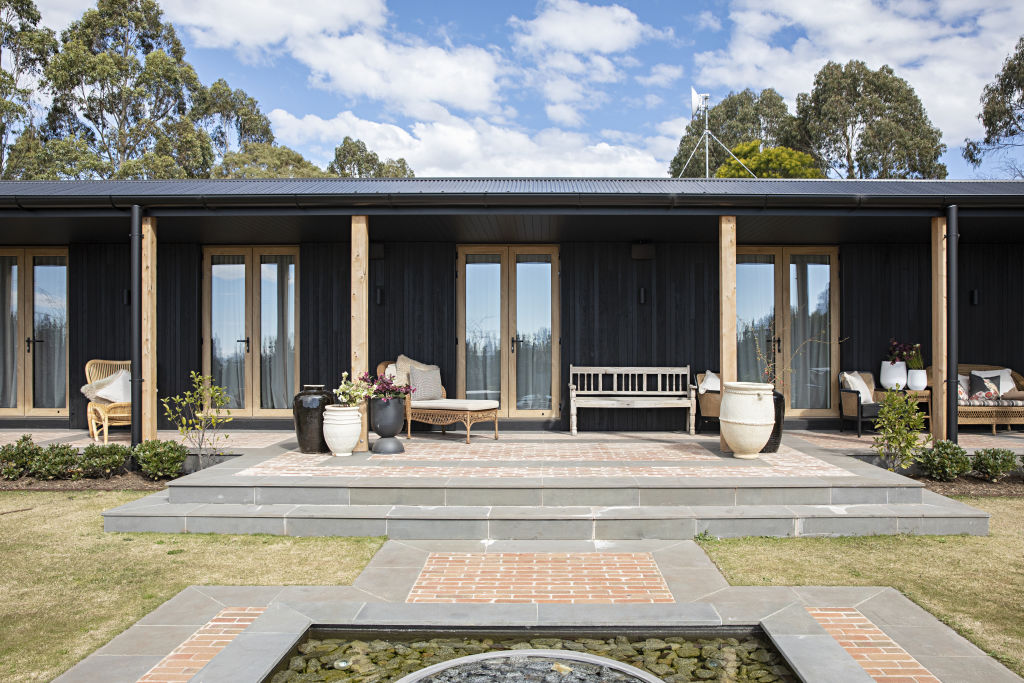 Cress and Armstrong moved to Gisborne during the COVID pandemic and found a  single-level 1980s kit home on a sprawling block. Photo: Natalie Jeffcott