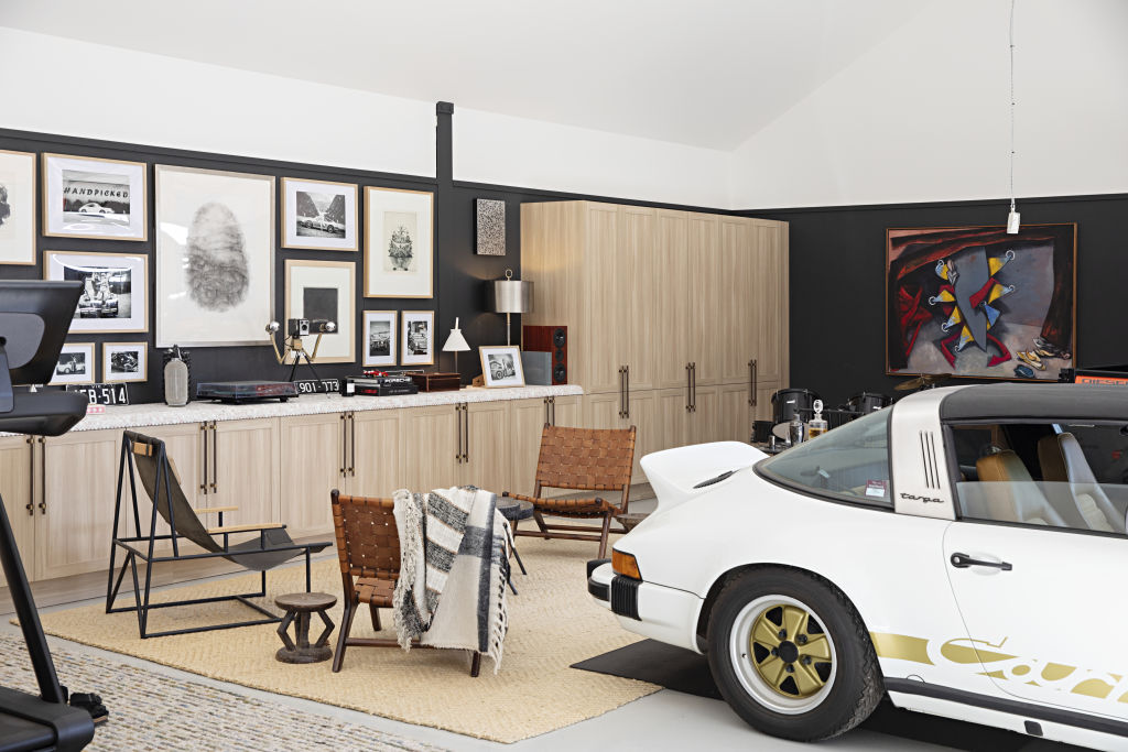 Cress' garage is filled with his parents artwork and is a place where 'I can now go with a couple of mates, have a whisky and listen to the record player'. Photo: Natalie Jeffcott