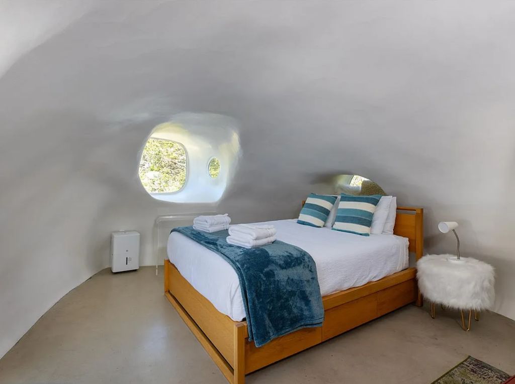 Cute round windows in the bedroom. Photo: Zillow