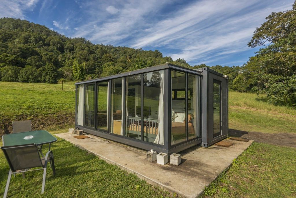 This glass-box hideaway makes more money than the typical Aussie worker