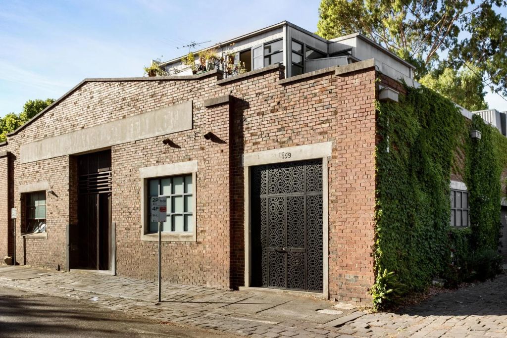 Award-winning author Tony Birch lists stylish tri-level factory conversion in heart of Fitzroy