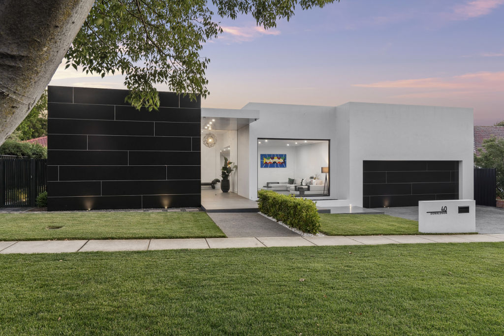 Geometric black and white exterior of a modern high-end Canberra home.